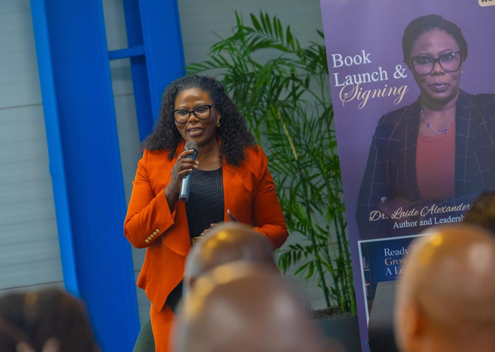 Dr. Laide Alexander speaking at her book launch and signing
